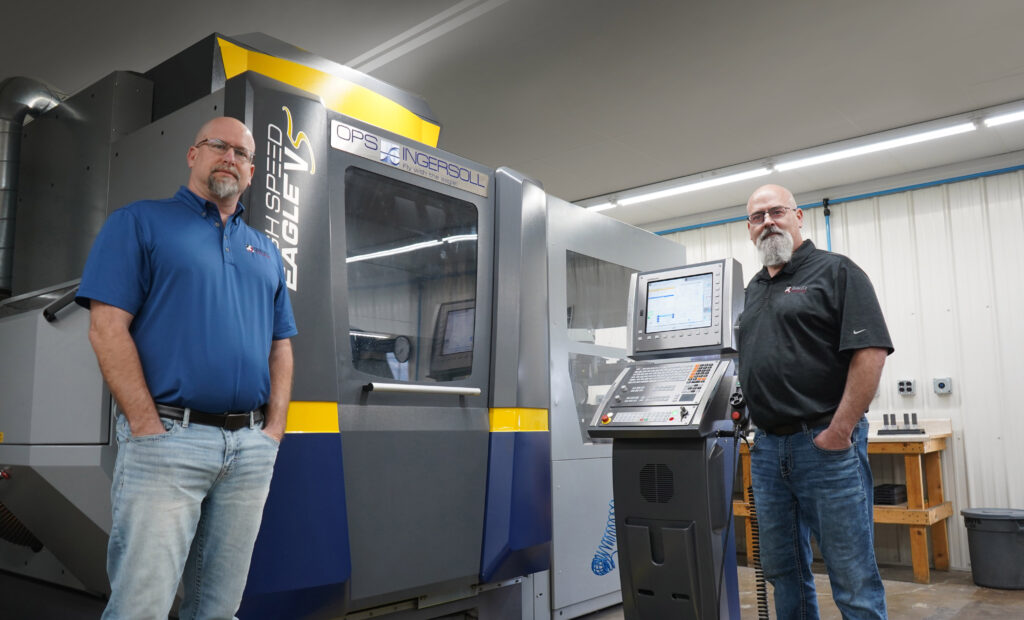 milling-machine-automation-techology two men standing in front of Ingersoll milling machine